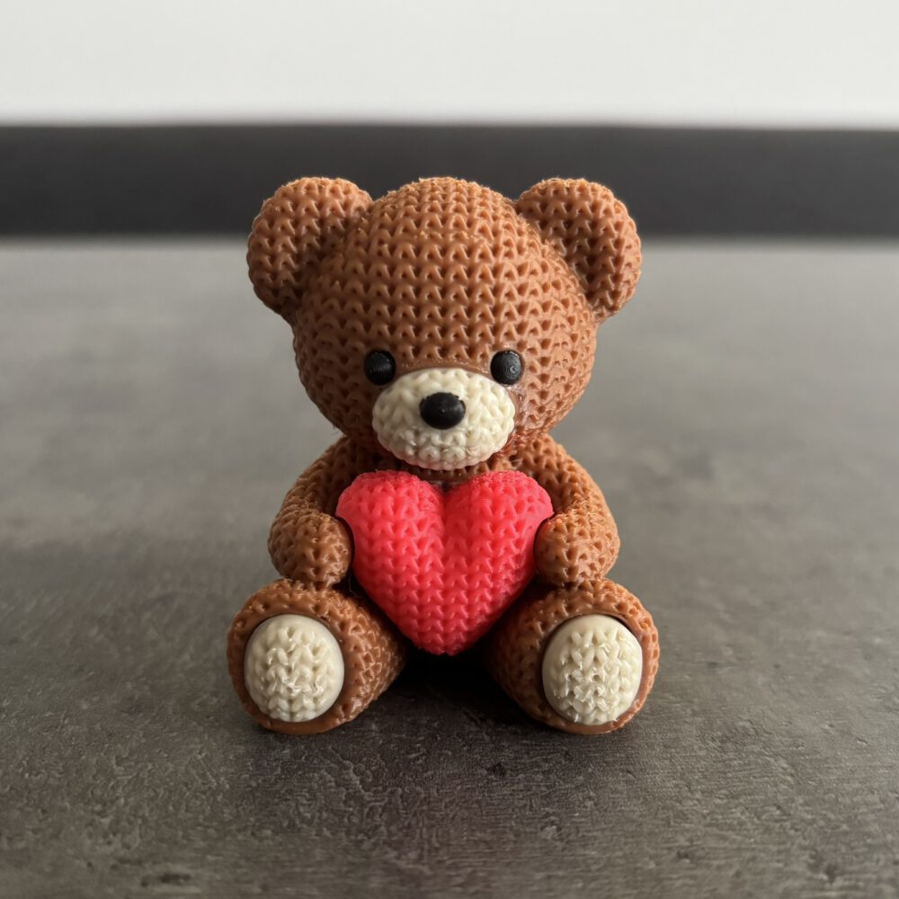 Teddybär mit Herz im Strickmuster