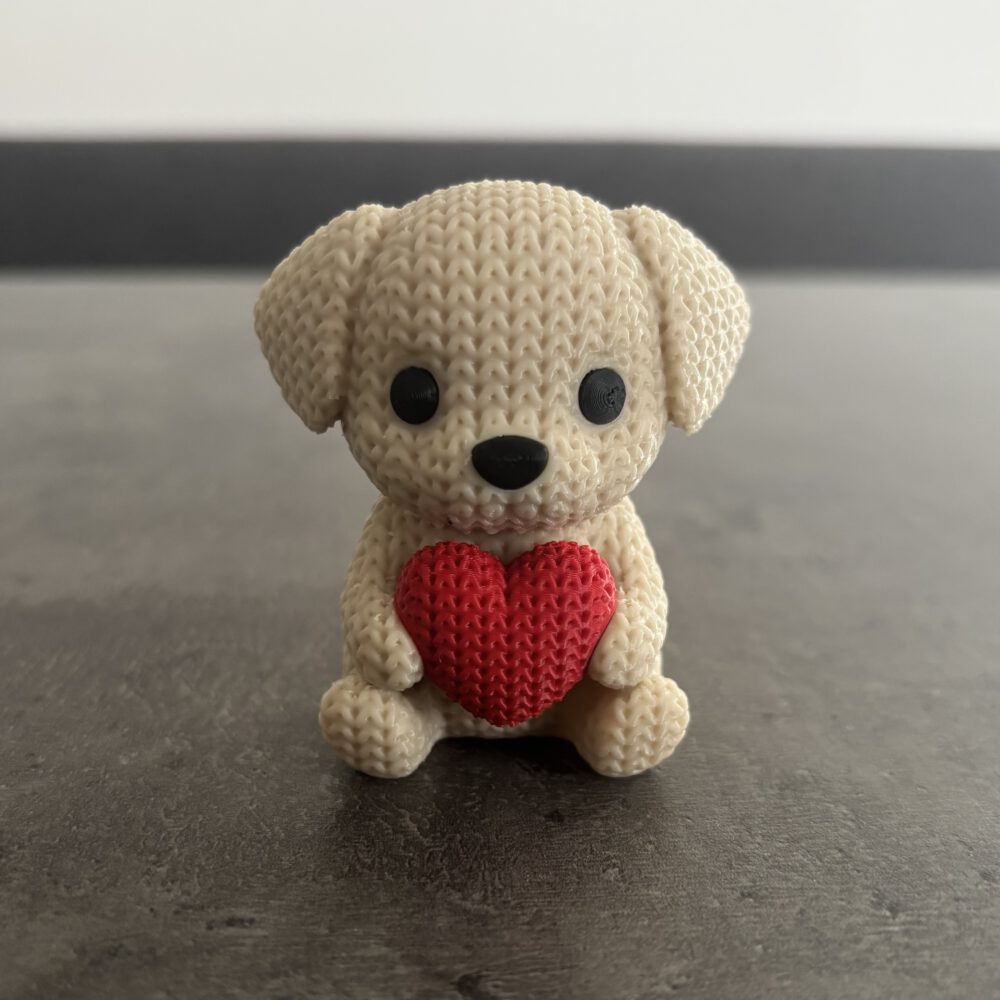 Hund mit Herz im Strickmuster